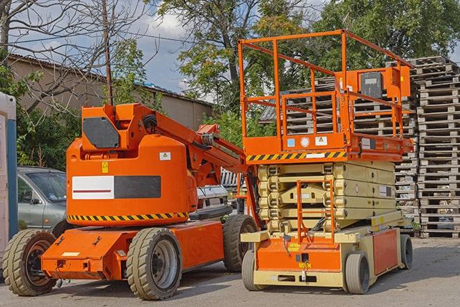 forklift carrying pallets in warehouse in Conestoga